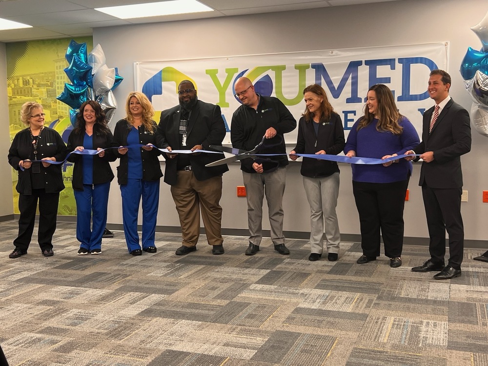 Group of instructors and administration at the December 6 YOUMed ribbon cutting 